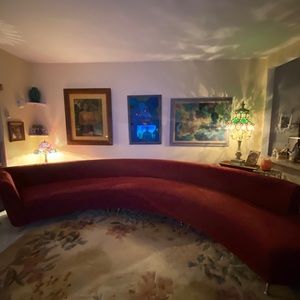 Elegant Curved Sofa in Rich Burgundy